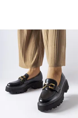 Black moccasins decorated with a buckle